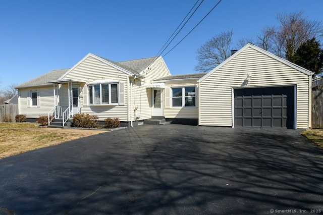 ranch-style house featuring a garage