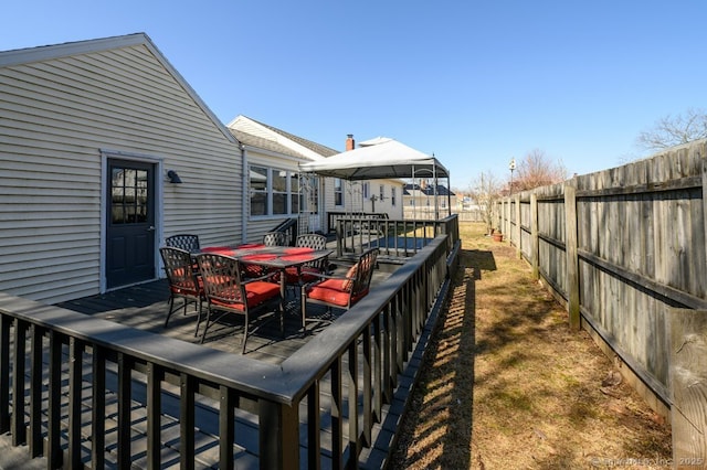 wooden terrace with a gazebo