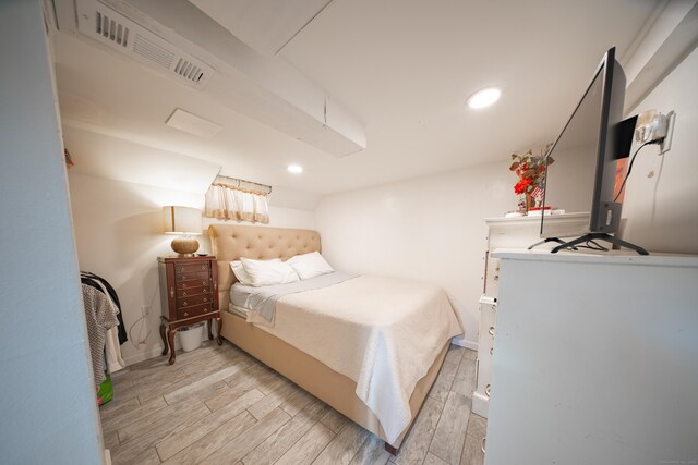 bedroom featuring light hardwood / wood-style flooring