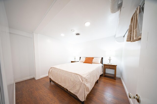 bedroom featuring dark hardwood / wood-style floors