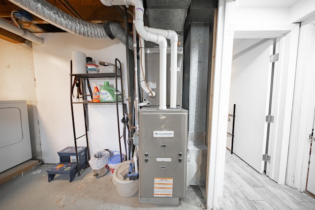 utility room featuring washer / dryer