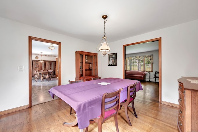 dining room featuring hardwood / wood-style flooring