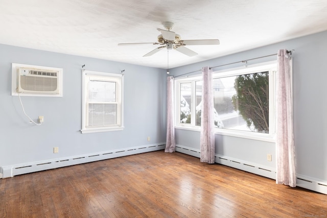 unfurnished room with wood-type flooring, a wall mounted air conditioner, ceiling fan, and baseboard heating