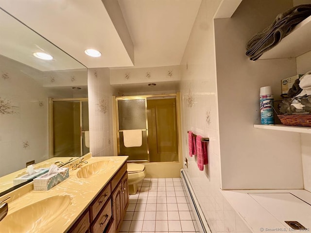 62 Rte 6n Rte, Carmel, NY 10541 - full bathroom featuring vanity, toilet, tile patterned floors, a baseboard radiator, and bath / shower combo with glass door
