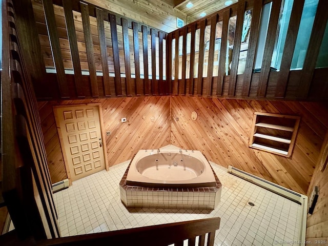 62 Rte 6n Rte, Carmel, NY 10541 - interior space featuring a whirlpool tub, a baseboard radiator, tile patterned floors, and wooden walls