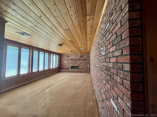62 Rte 6n Rte, Carmel, NY 10541 - unfurnished living room with wood ceiling, brick wall, a brick fireplace, a baseboard radiator, and carpet