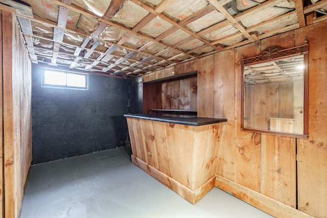 bar with concrete flooring