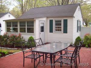 view of patio featuring a deck and outdoor dining area