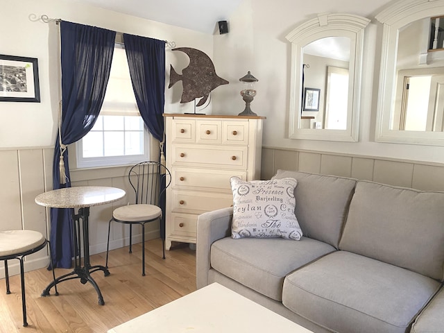 sitting room with light wood-style floors