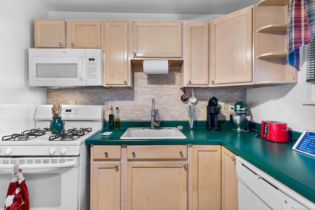 kitchen with tasteful backsplash, sink, light brown cabinets, and white appliances