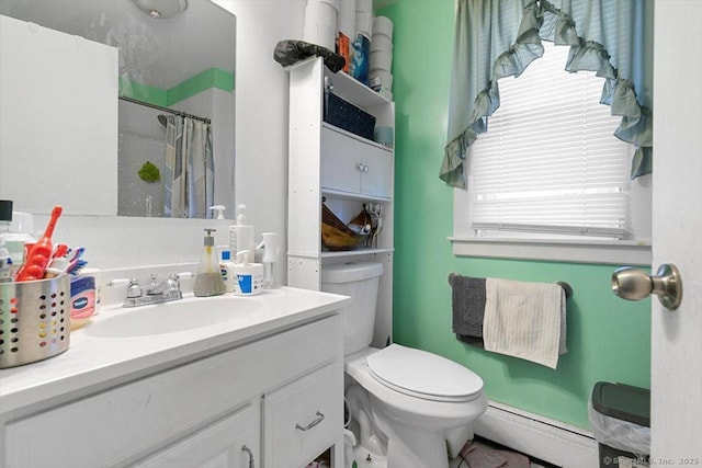 bathroom with a baseboard radiator, toilet, vanity, and walk in shower