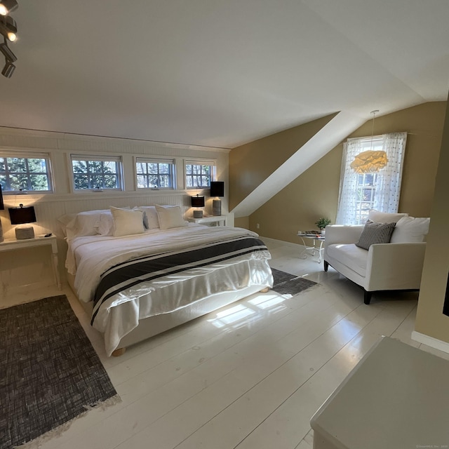 44 Brook St, Groton, CT 06340 - bedroom with wood finished floors and vaulted ceiling