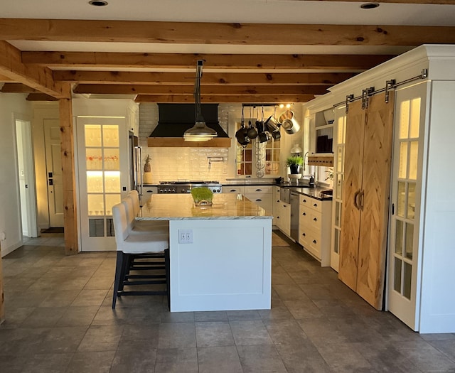 44 Brook St, Groton, CT 06340 - kitchen featuring custom exhaust hood, beam ceiling, backsplash, and white cabinetry