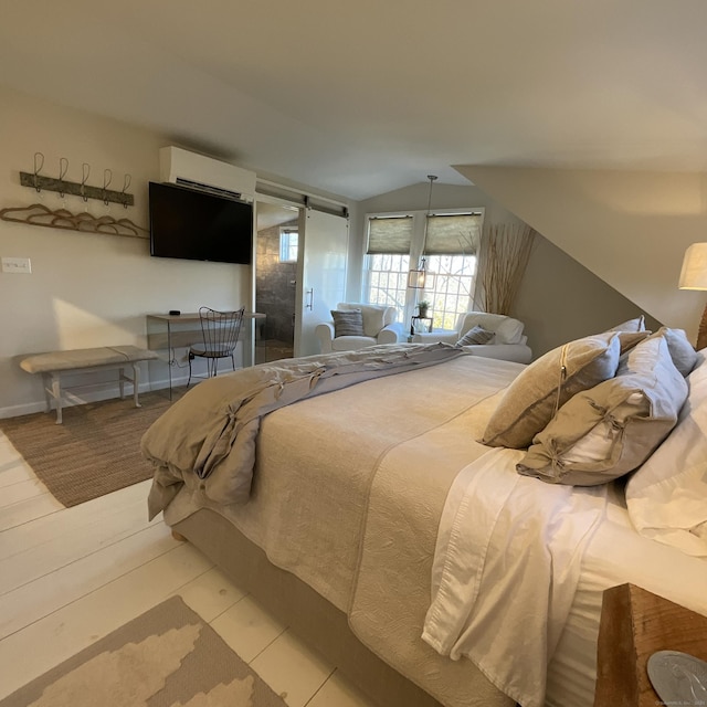 44 Brook St, Groton, CT 06340 - bedroom with a wall mounted air conditioner, baseboards, and vaulted ceiling