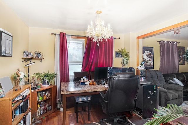 office space with dark wood-type flooring and a chandelier