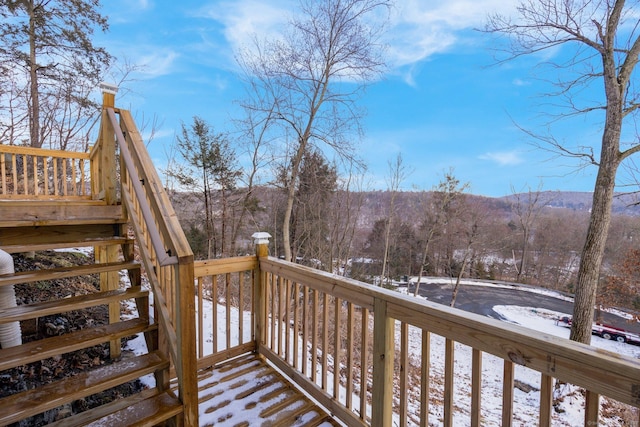 view of snow covered deck