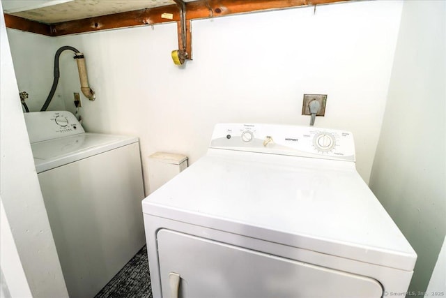 laundry room with separate washer and dryer