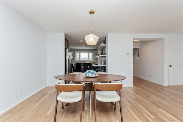 dining room featuring light hardwood / wood-style flooring