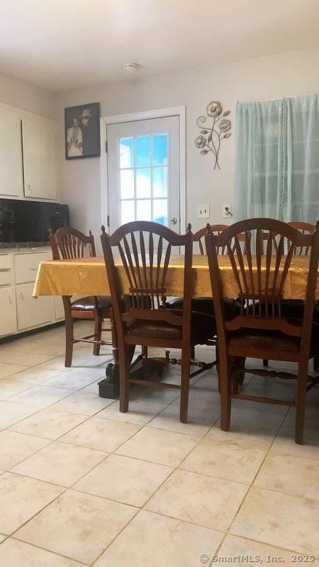 view of tiled dining area