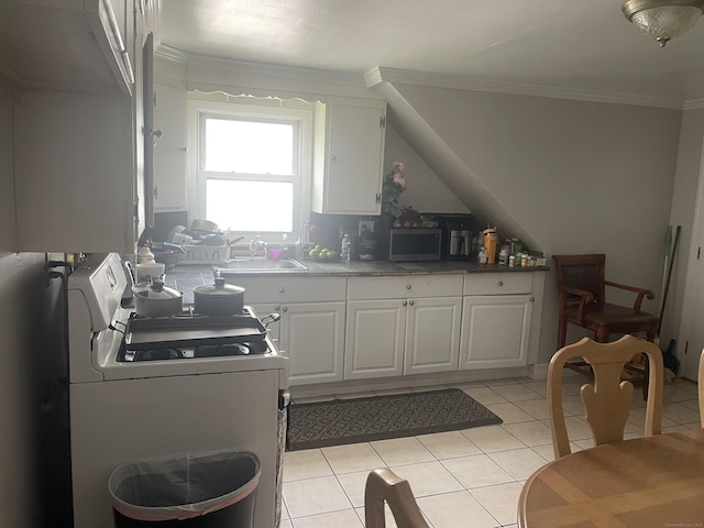 kitchen featuring sink, white cabinetry, crown molding, light tile patterned floors, and white range with gas cooktop