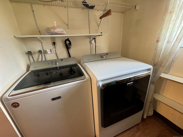 laundry room with washing machine and dryer