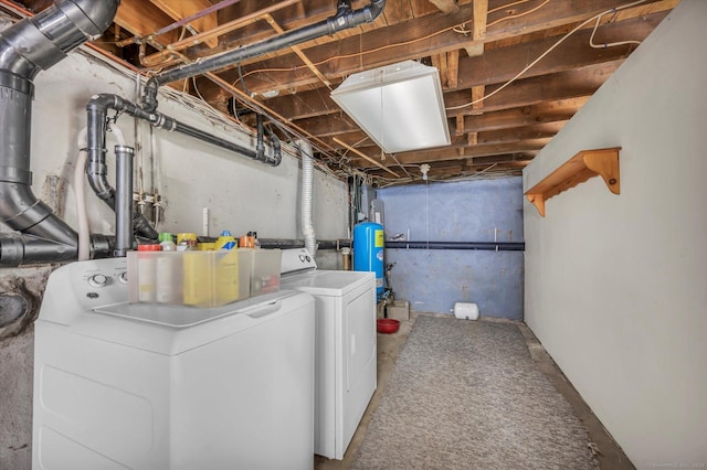 washroom with washer and dryer