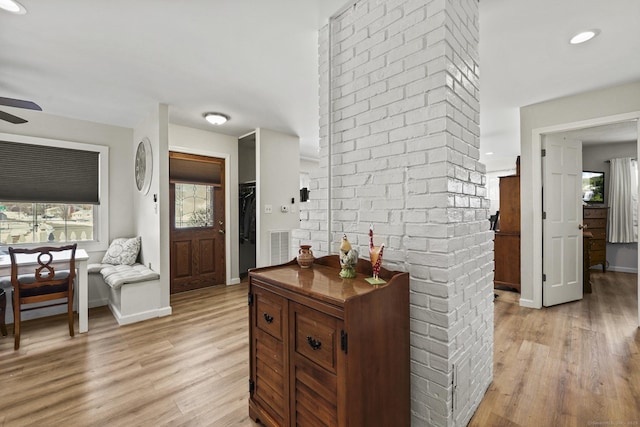 hallway featuring light hardwood / wood-style floors