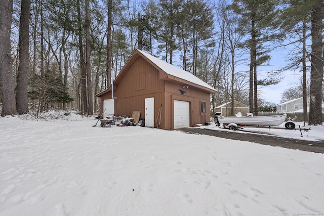 view of snow covered garage