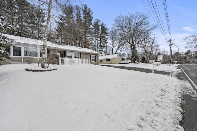 view of yard covered in snow