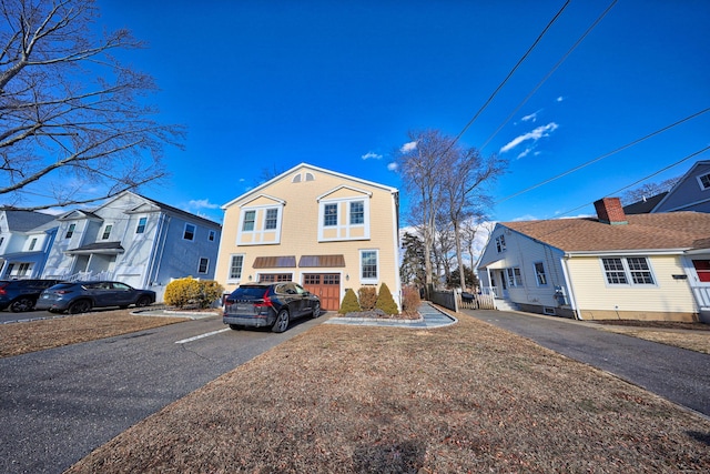 view of front of property featuring a garage