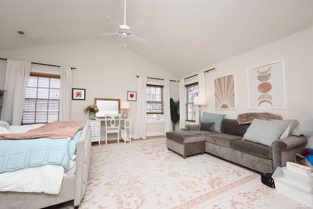 living room with ceiling fan and lofted ceiling