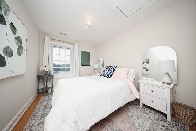 bedroom featuring hardwood / wood-style flooring