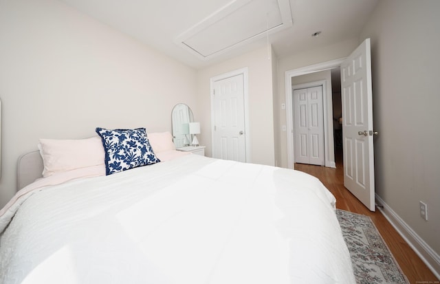 bedroom featuring hardwood / wood-style flooring