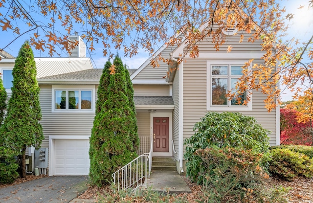 view of front of property featuring a garage