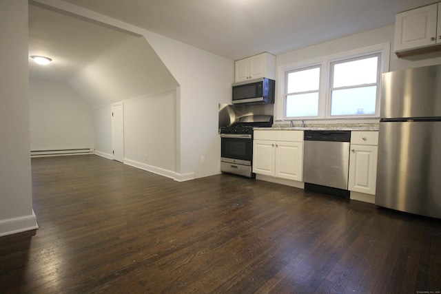 kitchen with lofted ceiling, dark wood-type flooring, stainless steel appliances, white cabinets, and a baseboard radiator