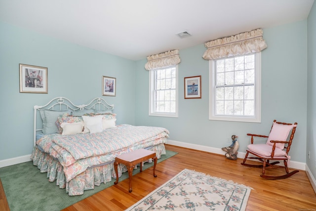 bedroom featuring hardwood / wood-style floors