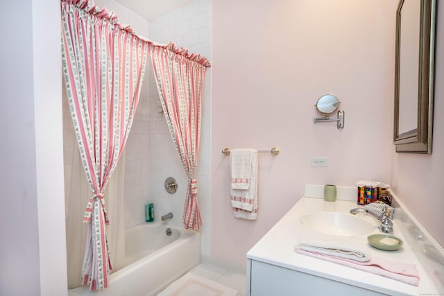 bathroom featuring vanity, tile patterned flooring, and shower / bath combo with shower curtain