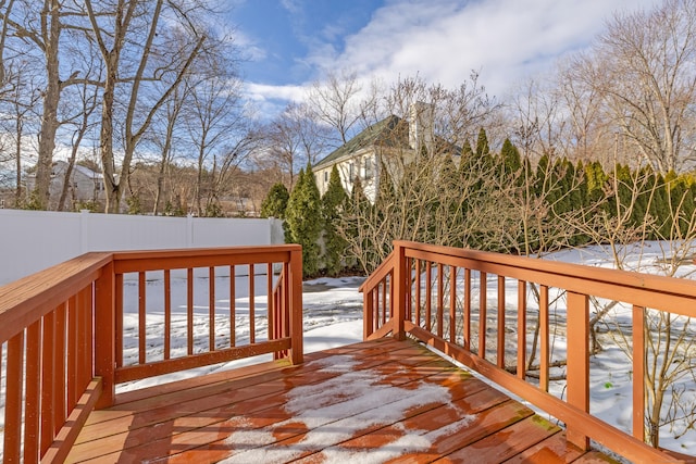 view of snow covered deck