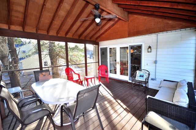 sunroom with vaulted ceiling with beams and ceiling fan