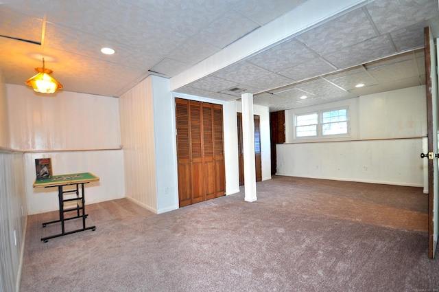 basement featuring carpet floors