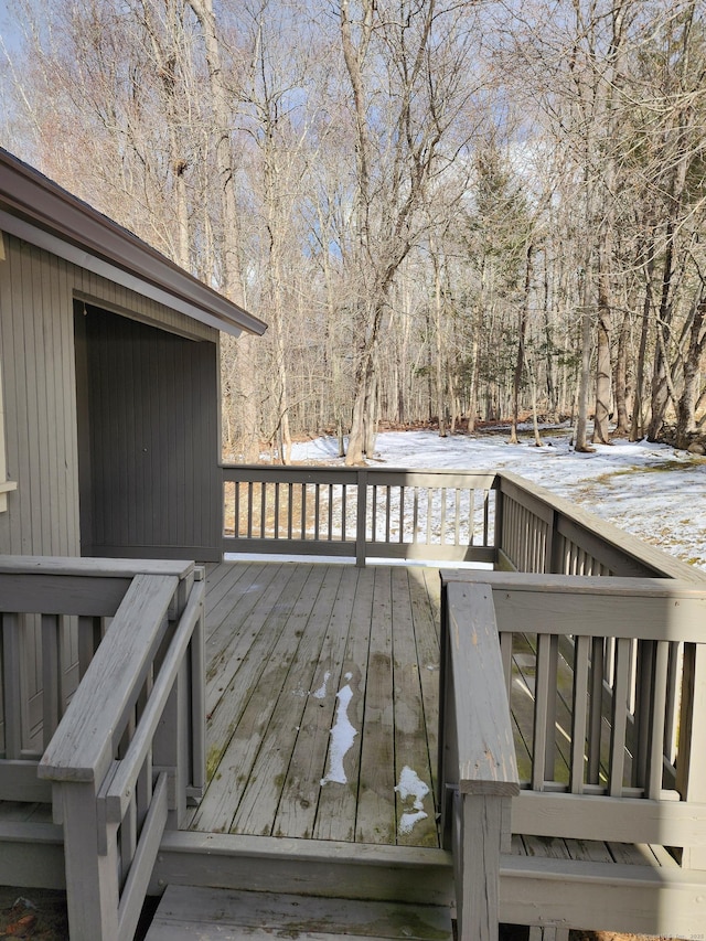 view of snow covered deck