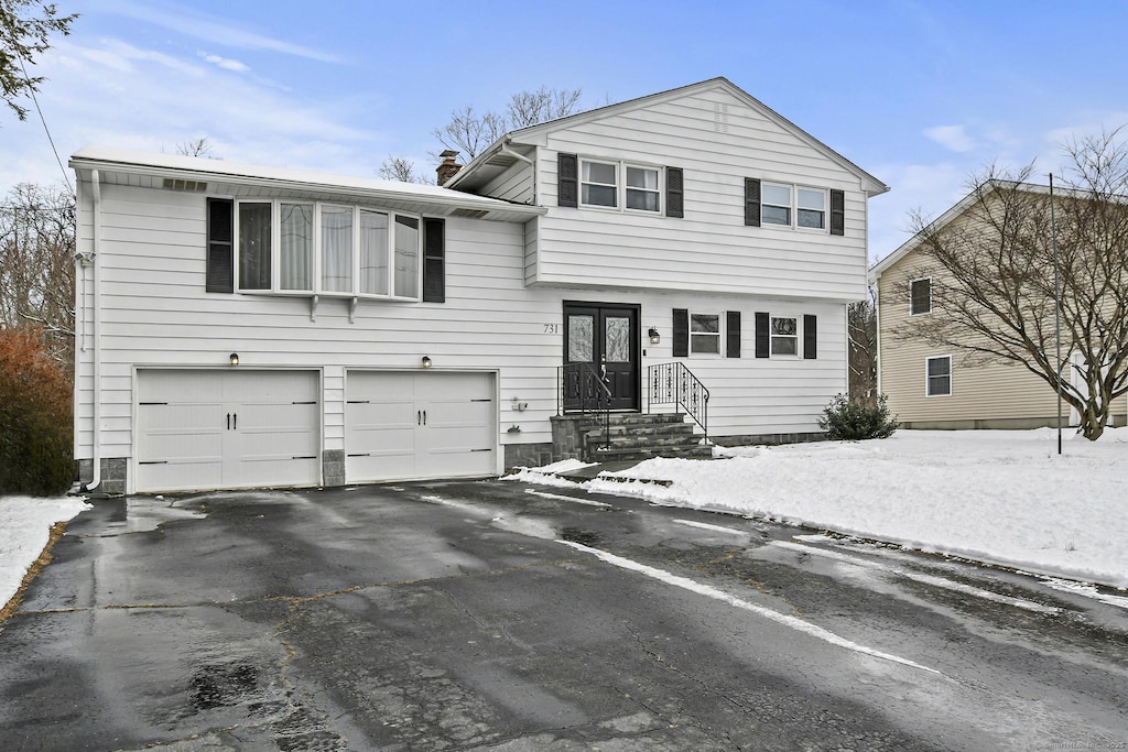 view of front of house with a garage