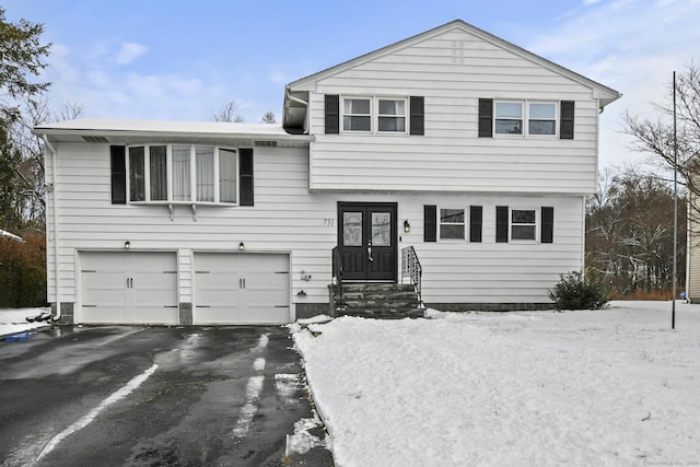 tri-level home featuring a garage