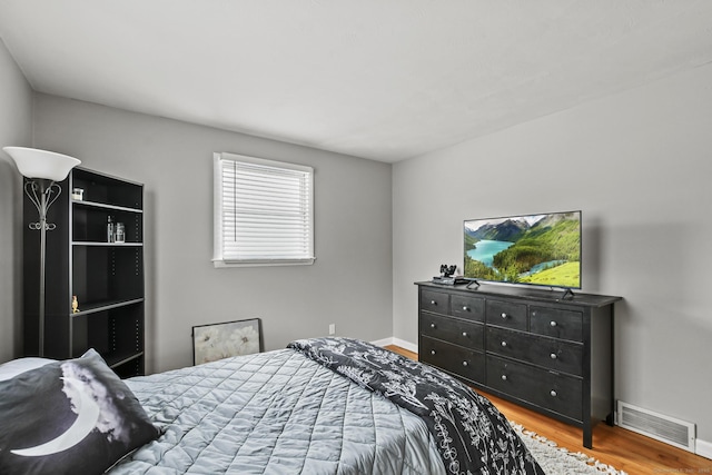 bedroom featuring wood-type flooring