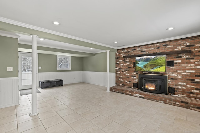 unfurnished living room featuring ornamental molding and light tile patterned floors