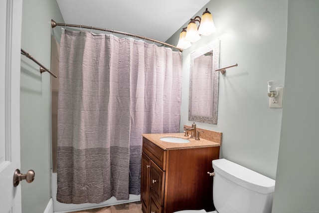 full bathroom with vanity, toilet, and shower / bath combo