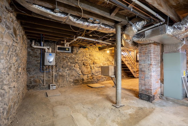 basement featuring heating unit