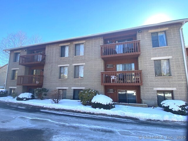 view of snow covered property