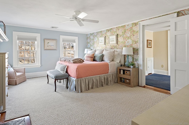 bedroom featuring crown molding and ceiling fan