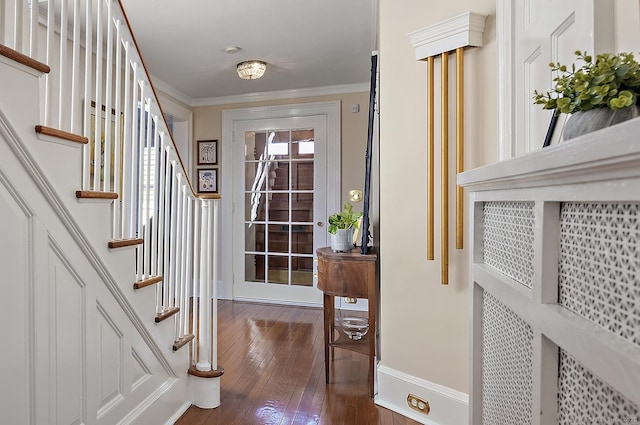 interior space with crown molding and dark hardwood / wood-style floors